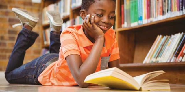 child reading a book