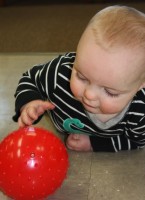 Boy with red ball Boy with red ball